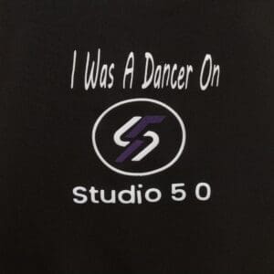 A black shirt with the words " i was a dancer on studio 5 0 ".