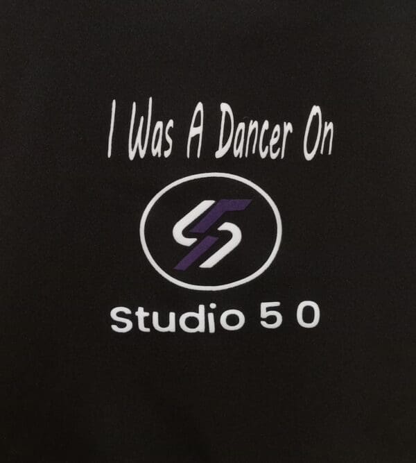 A black shirt with the words " i was a dancer on studio 5 0 ".