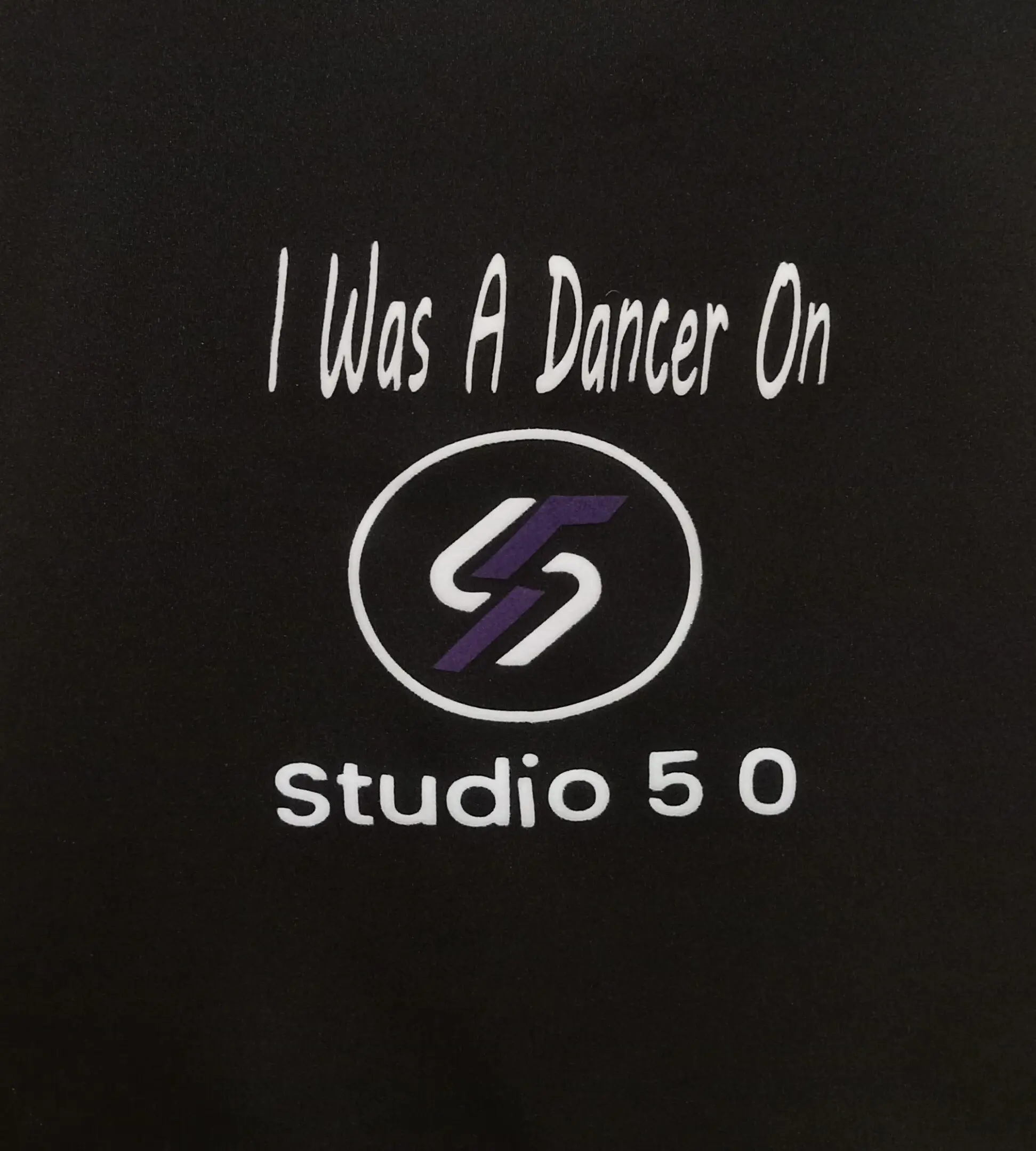 A black shirt with the words " i was a dancer on studio 5 0 ".